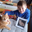 Animal Profile Competition - Overall Winner: Hector with his cat and drawing done by Bernadette Ballantyne!